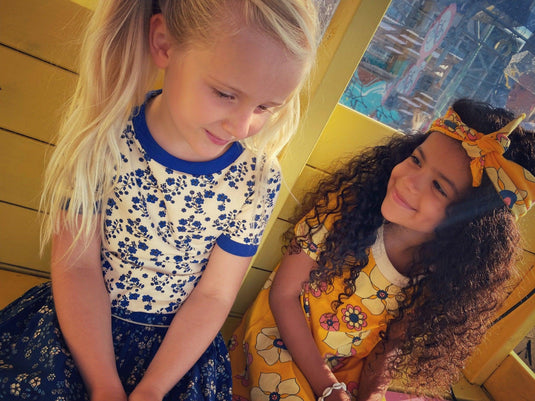 scandinavian young girls wearing retro clothes by Albababy or AlbaofDenmark.