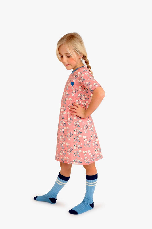Scandinavian child wearing Girls summer dress in pink organic cotton and flowers