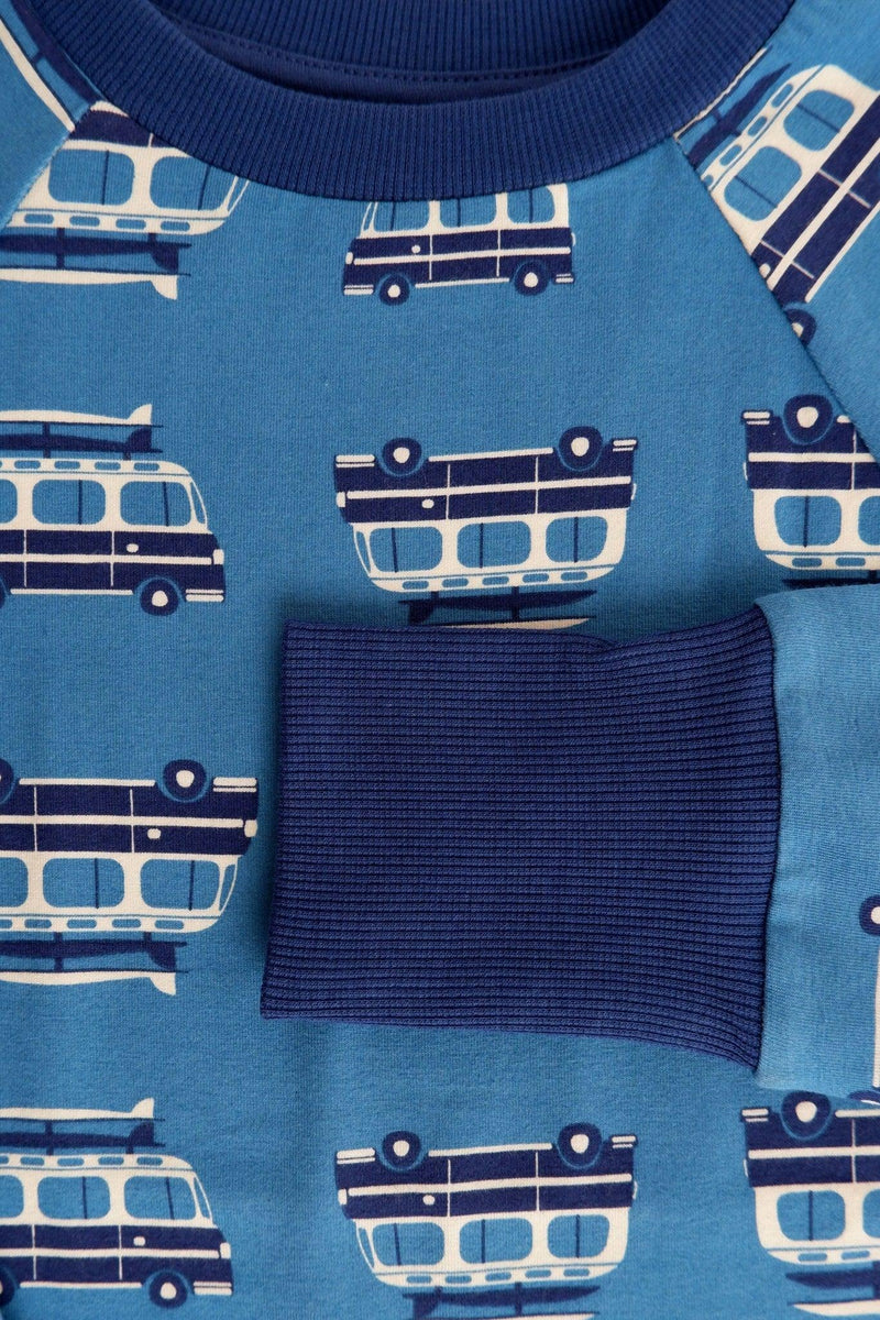 Load image into Gallery viewer, Front pocket detail of blue organic t-shirt with long arms and boat print
