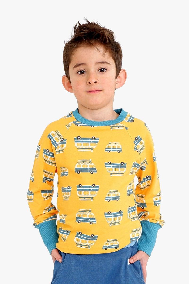 Load image into Gallery viewer, DAnish Child wearing Bright yellow long sleeve organic t-shirt with van print
