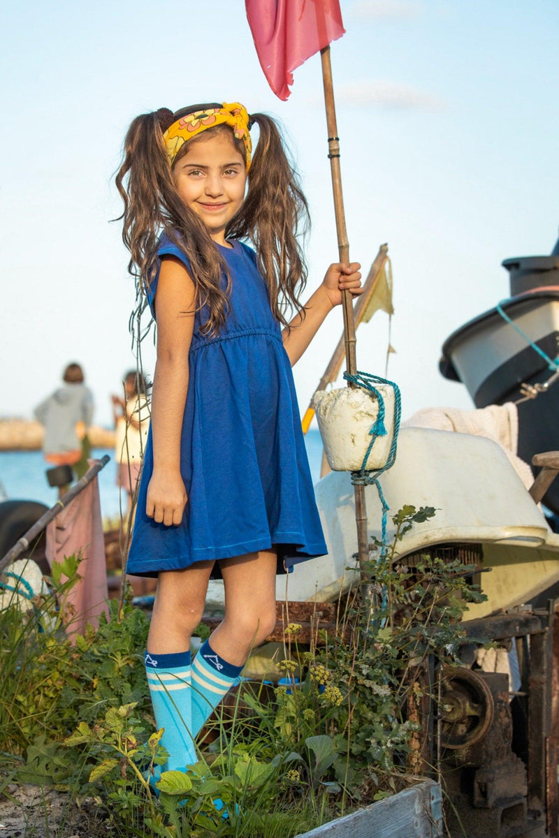 Load image into Gallery viewer, Danish girl wearing a Blue organic dress in retro look for girls
