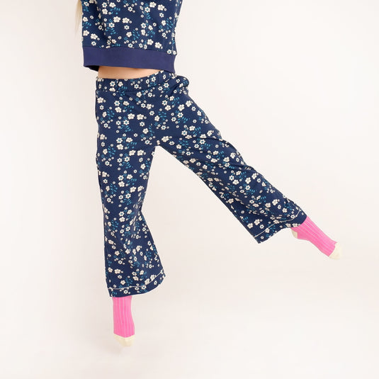 organic wide leg trousers in dark blue with small white flowers for girls