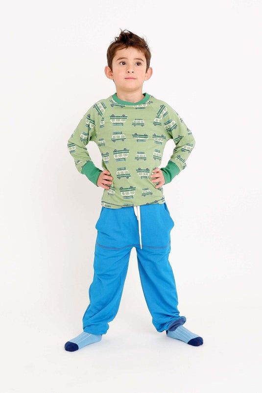 boy wearing kristoffer pants in organic bright blue cotton for kids