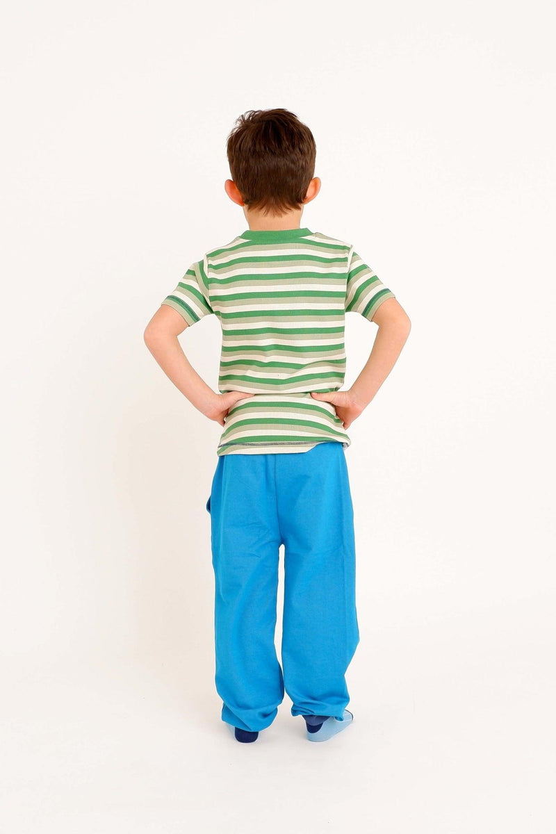 Load image into Gallery viewer, Back detail of the kristoffer pants in organic bright blue cotton for kids
