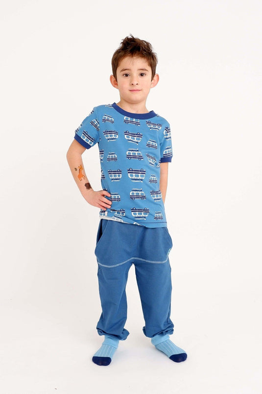 boy wearing mason pants in organic blue cotton soft jersey