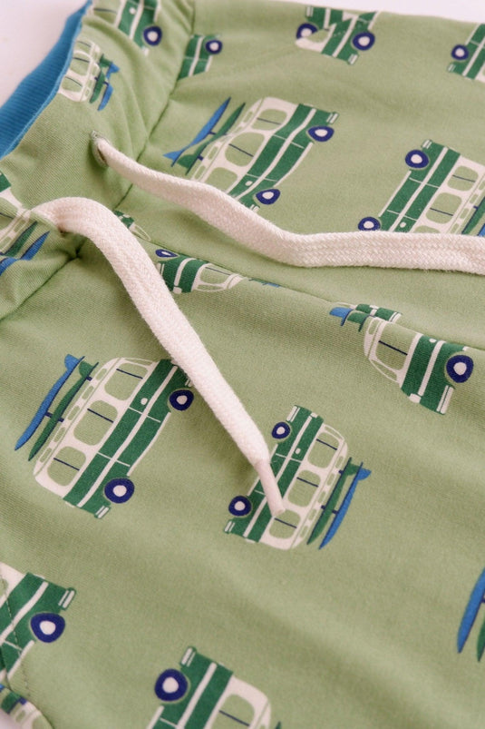 Van detail of Lucca baby pants in soft green organic cotton